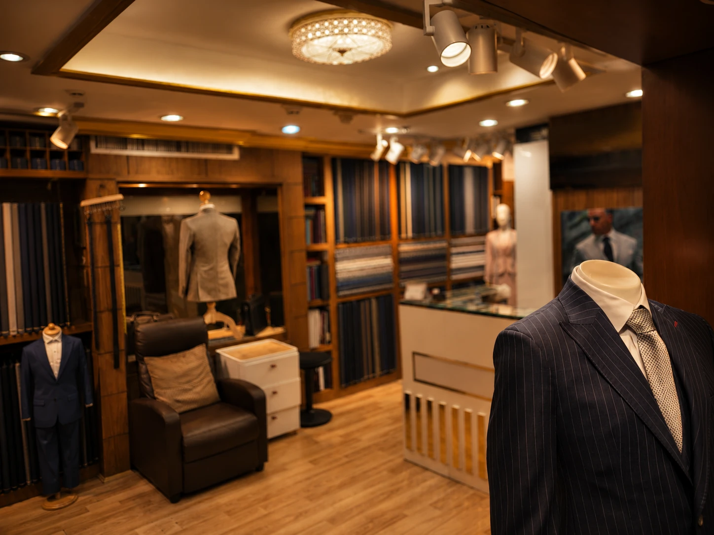 Bespoke suits and Thai silk garments on display at Om Fashion, a custom tailor in Bangkok